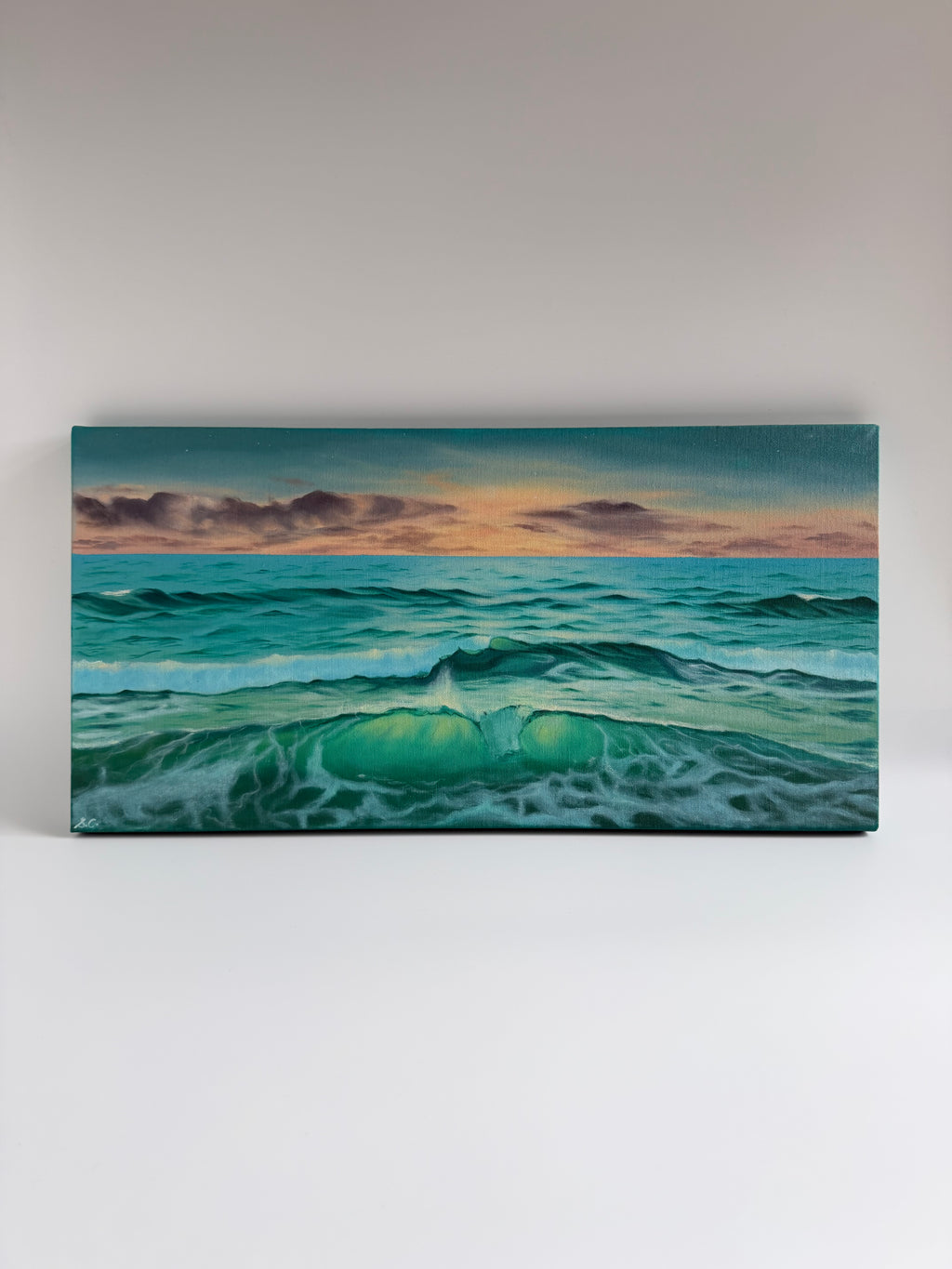 Original panoramic beach sunset oil painting featuring emerald waters and warm golden light.