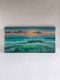 Original panoramic beach sunset oil painting featuring emerald waters and warm golden light.