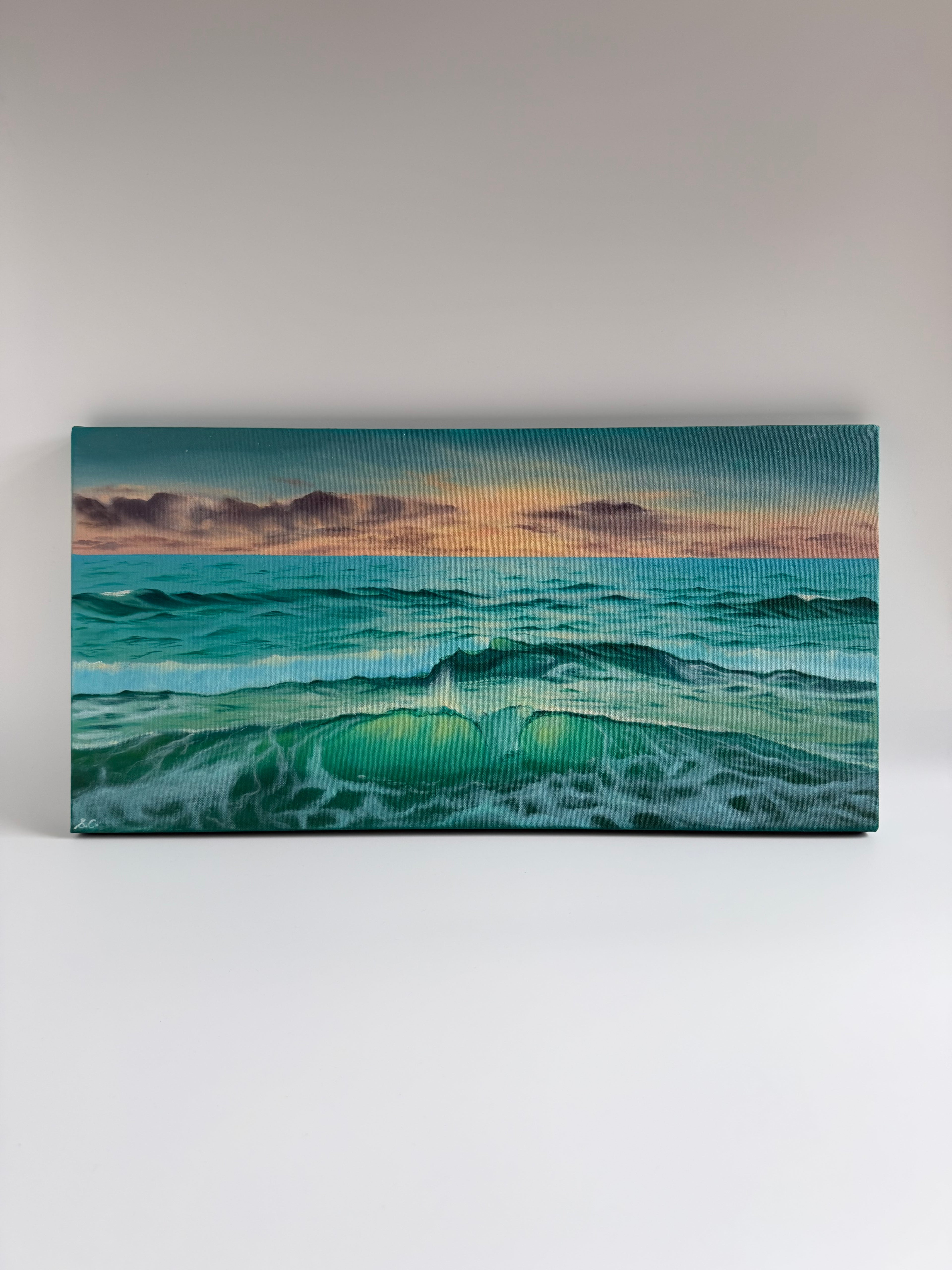 Original panoramic beach sunset oil painting featuring emerald waters and warm golden light.