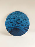 Original round ocean oil painting featuring deep navy blue coastal waters on a 14-inch canvas.