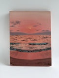 Original beach sunset oil painting featuring soft pink skies and calm ocean waves on a 9 × 12 stretched canvas.
