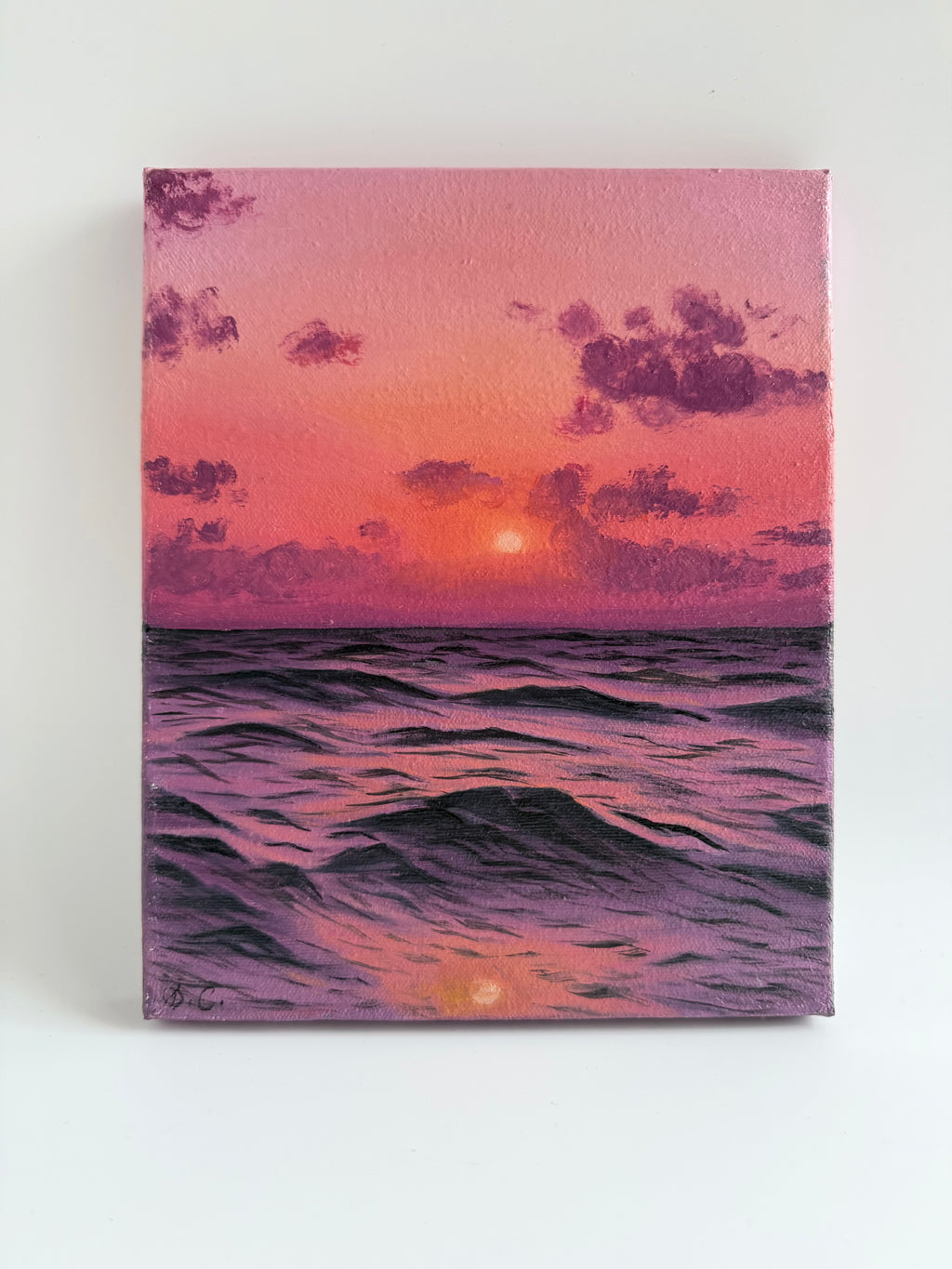 Original beach sunset oil painting featuring vibrant pink, orange, and violet skies reflected over calm ocean waves on an 8 × 10 canvas by Shreya Chandra.