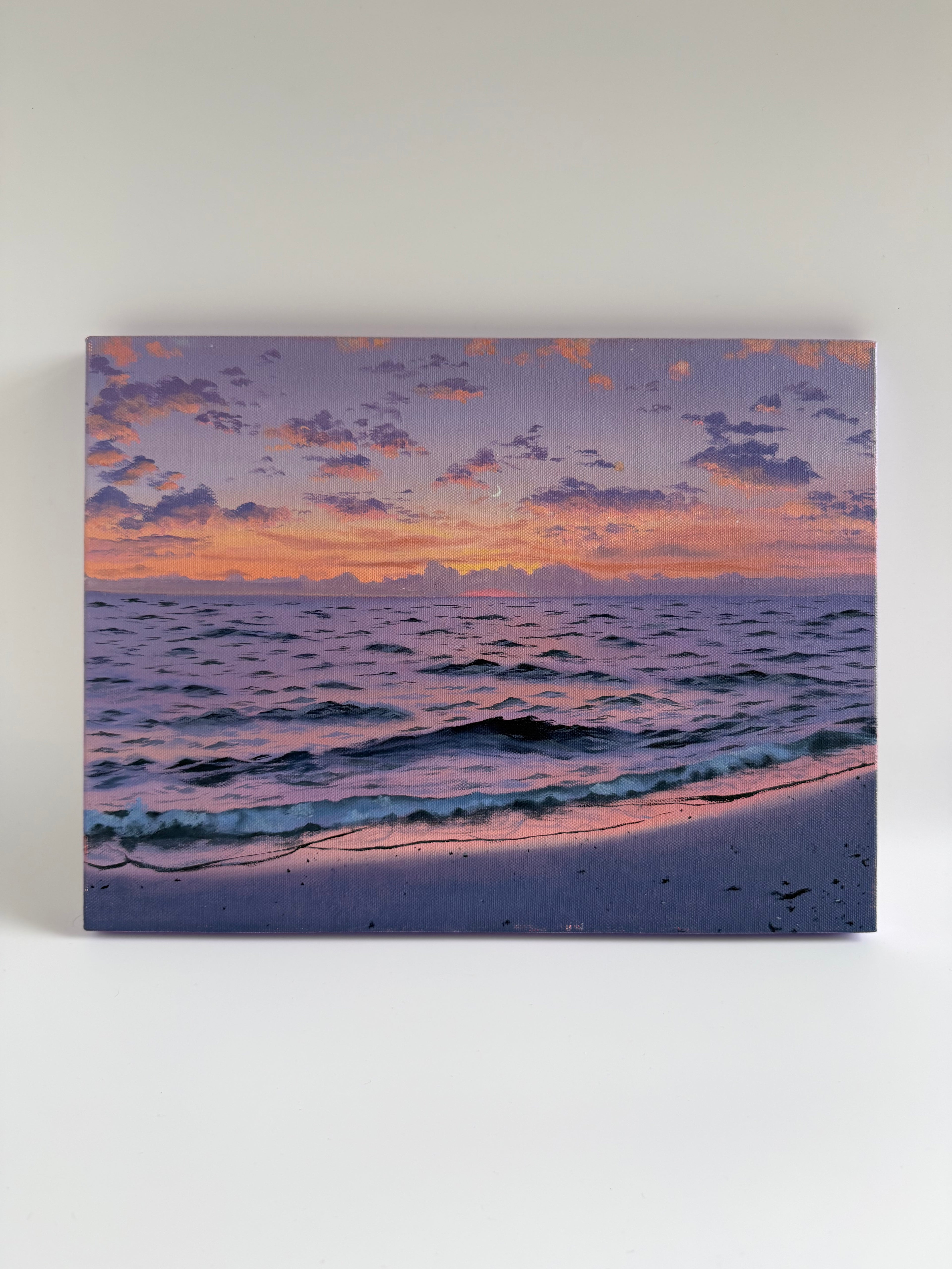 Original purple beach sunset oil painting featuring vibrant evening skies over the ocean.