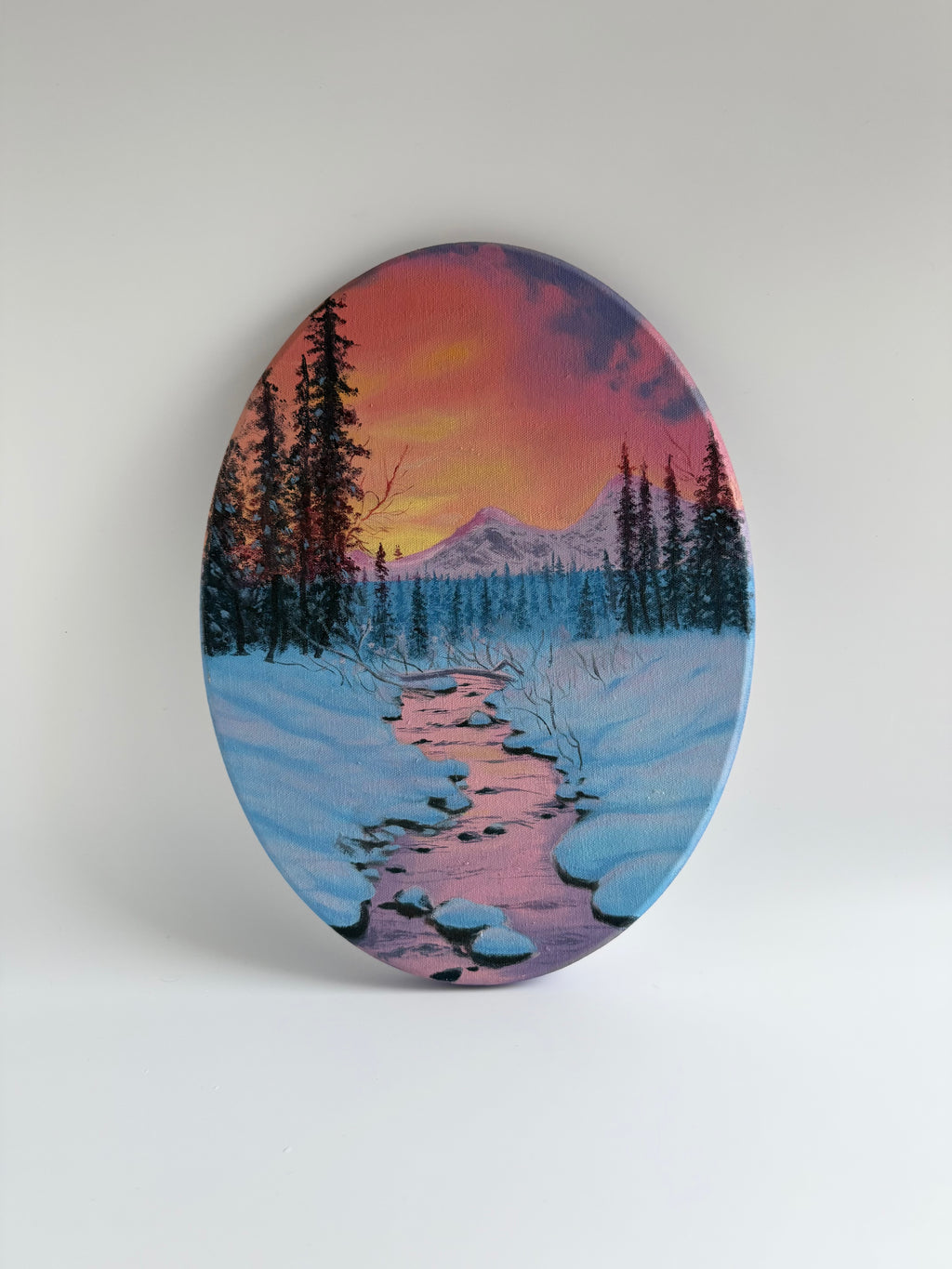 Original oval winter landscape oil painting featuring a peaceful snow-covered river and forest.
