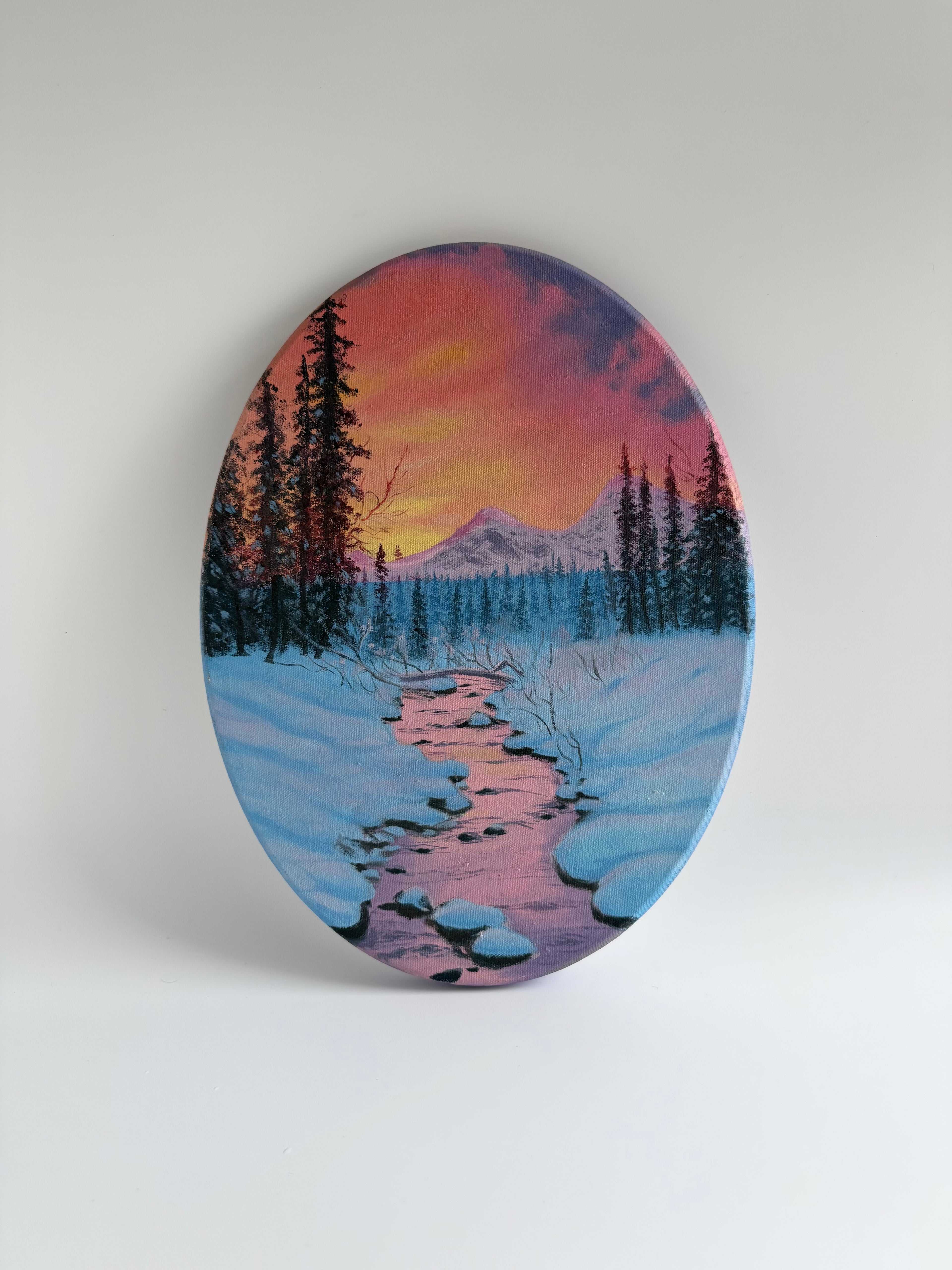 Original oval winter landscape oil painting featuring a peaceful snow-covered river and forest.
